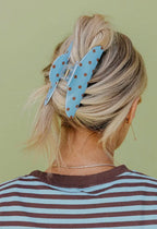 brown and blue polka dot claw clip