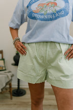 green linen shorts